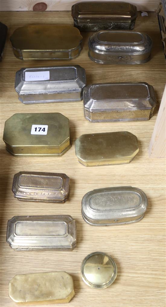 A collection of twelve brass and nickel alloy betel nut boxes, 19th/20th century